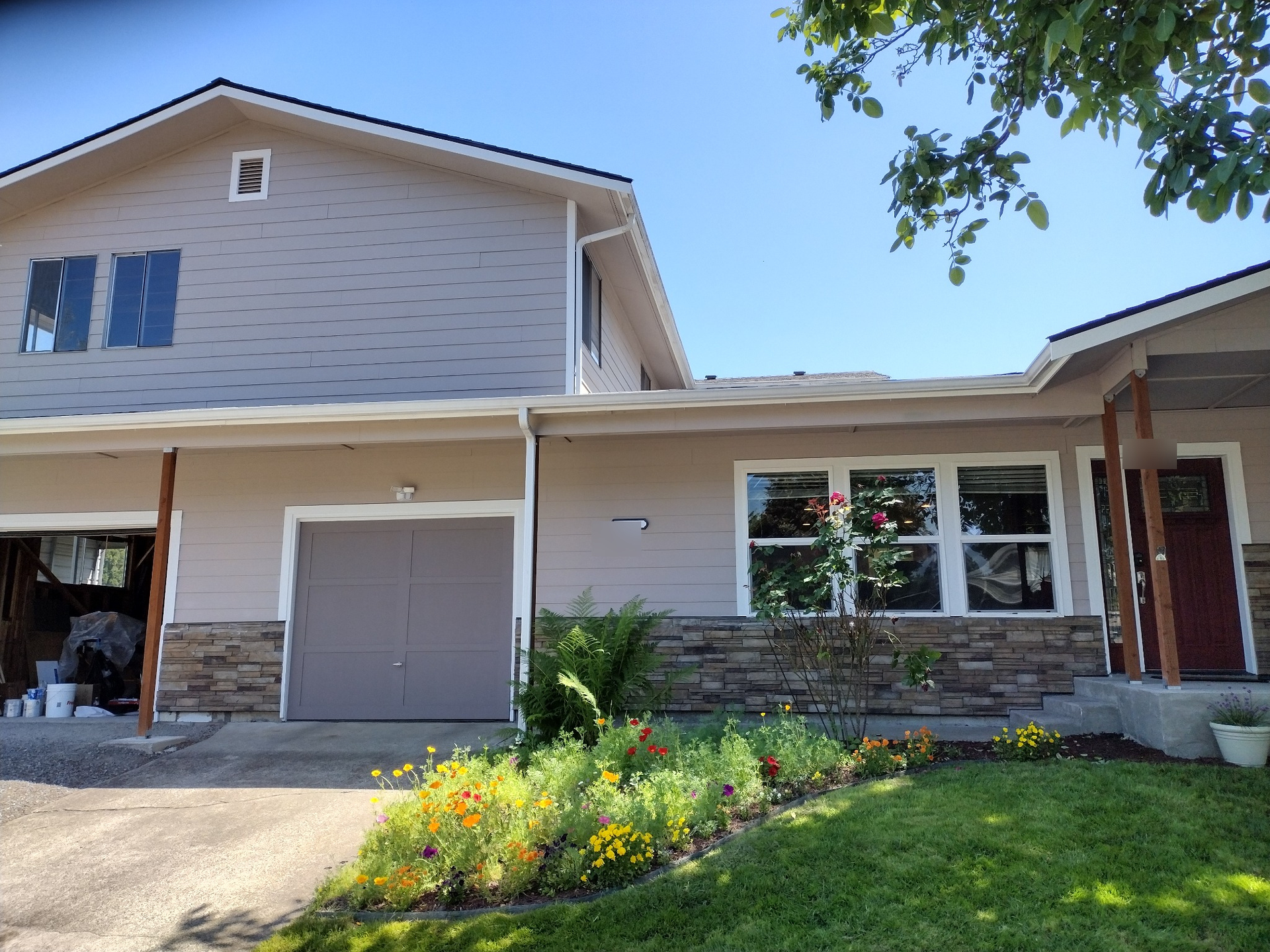 Finished residential exterior painted by Timber & Tail Painting Co.